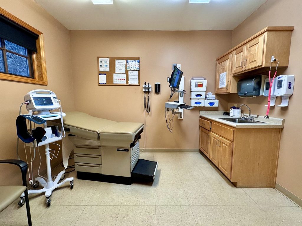 doctor speaking with patient in clinic