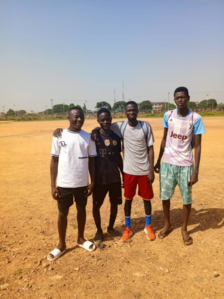 Youth Football Coaches Rethink Feedback to Keep Teenagers in Sport young footballers training on a grass field